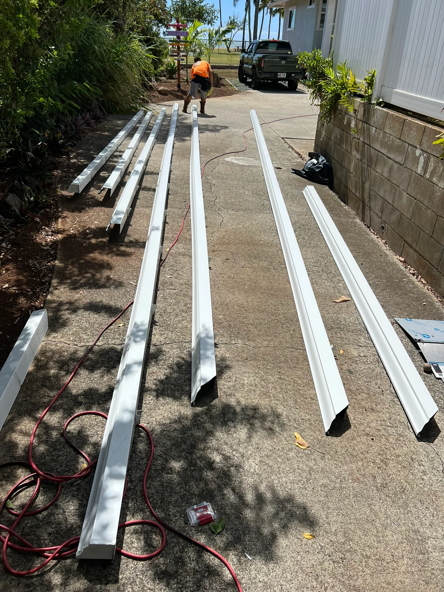 Placeholder image from Placehold.co - Professional gutter service team working on a home on Oahu